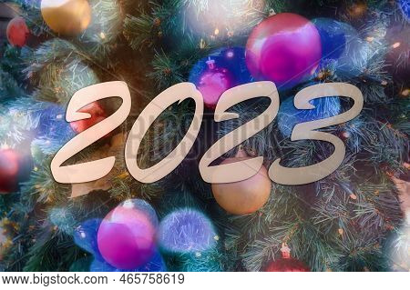 Blurry Bokey Christmas Lights During Holiday Season And 2023 Sign