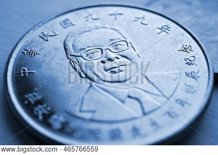 Translation: 100 Years Of Republic Of China.10 Yuan. Ten Taiwan Dollars. Taiwanese Coins Blue Tinted
