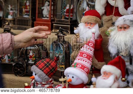 Shallow Depth Of Field (selective Focus) Details With The Hand Of A Woman Reaching For Christmas Gif