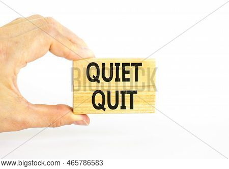 Quiet Quit Symbol. Concept Words Quiet Quit On Wooden Blocks. Beautiful White Table White Background
