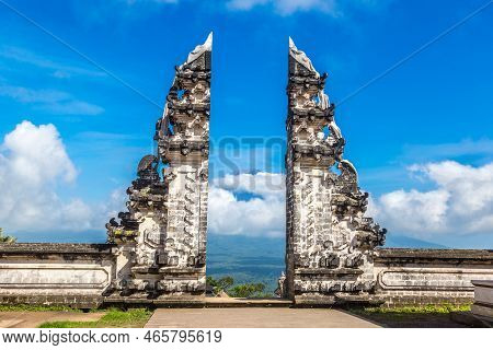 Ancient Gate At Pura Penataran Agung Lempuyang Temple And Volcano Agung On Bali, Indonesia In A Sunn