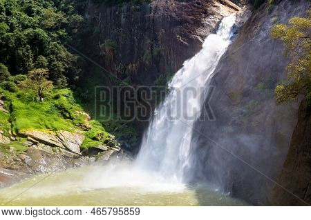 Dunhinda Waterfall In A Sunny Day In Sri Lanka