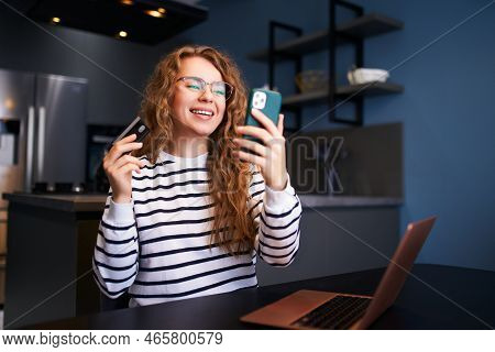Happy Woman Makes Purchase, Payment In Fintech App On Phone. Shopper Girl Uses Mobile Banking App, C