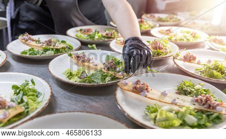 Chef Is Making Final Touch To The Plate