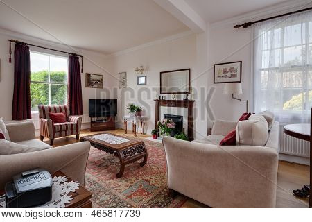 Foxton, Cambridgeshire - June 21 2018: Traditionally Furnished Living Room With Exposed Timber Floor