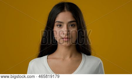 Female Portrait In Yellow Studio Background Indian Ethnic Woman Lady Girl Showing Mind Blowing Head 