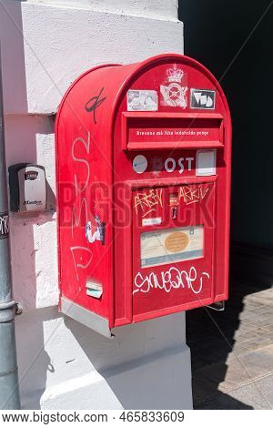Copenhagen, Denmark - July 26, 2022: Red Post Box Of Danish Post (post Danmark).