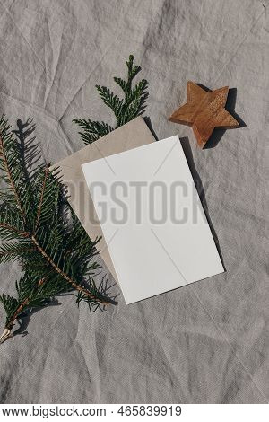 Natural Christmas Stationery Still Life. Blank Greeting Card, Invitation Mock Up With Wooden Star Or