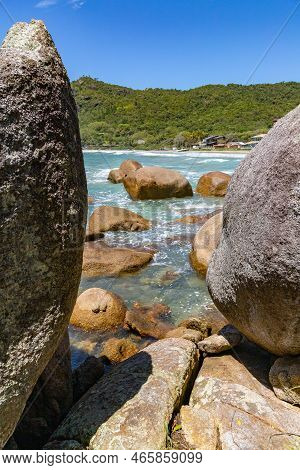 Rocks, Waves And Forest In The Beach