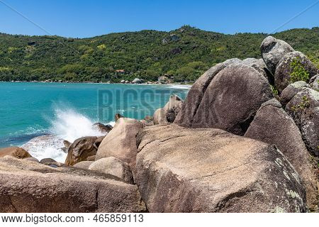 Rocks, Waves And Forest In The Beach