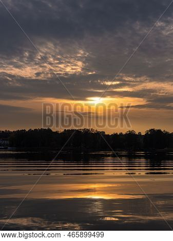 Sunset Over The Lake Haussee In The City Feldberg, Germany.