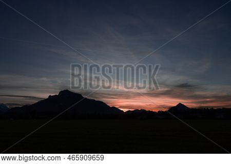 The Relief Of The Alpine Mountains In A Bright Pink Sunset In The Vicinity Of Salzburg, Austria
