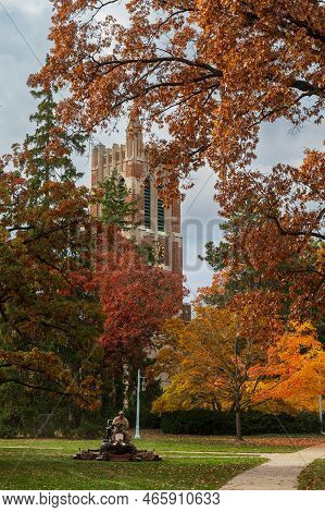 East Lansing Mi - October 18, 2022:beaumont Tower During The Fall With Lawnmower