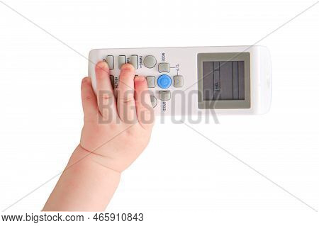 Baby Toddler Boy Holds The Air Conditioner Remote Control In His Hand, Isolated On A White Backgroun