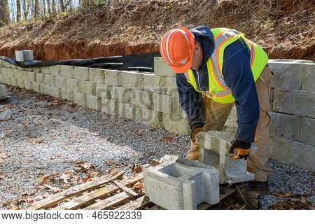 During Constructed Of New Retaining Wall Project There Was Contractor Installing Concrete Block Wall