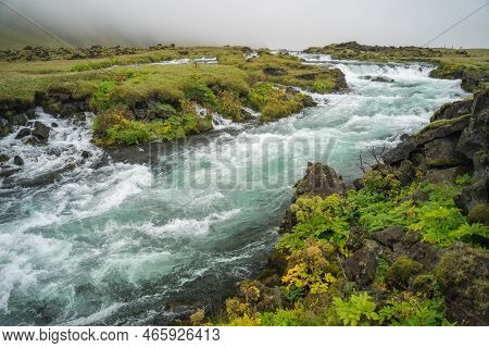Foss River And Icelandic Landscape. Scandinavian Amazing Nature