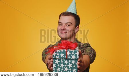 Positive Smiling Teen Man Presenting Birthday Gift Box Stretches Out Hands, Offer Wrapped Present Ca