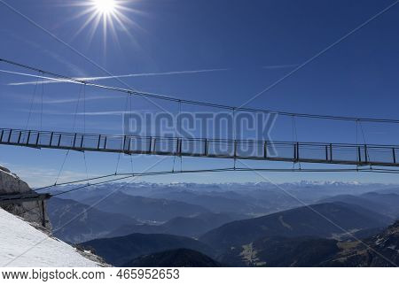 Alpine Suspension Bridge Over A Precipice In The Dachstein Mountain Region