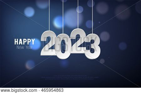 Happy New Year 2023. Hanging Paper Cut Number And Bokeh Bubber On Blue Gradient Background.