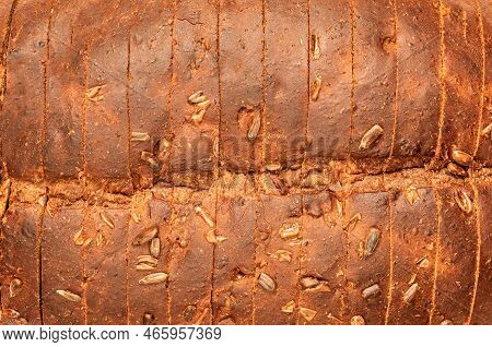 Organic Wholegrain Bread As A  Background Closeup. Pattern. Fresh Bread Texture