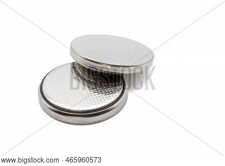 Two Small Button Lithium Batteries Isolated On A White Background