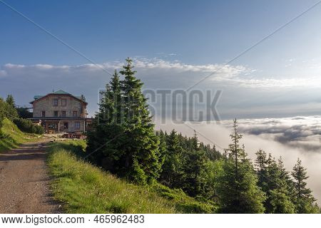 Old Stone Mountain  Cottage  In Jeseniky Mountains On A Summer Foggy Morning And  Sea Of Clouds Arou