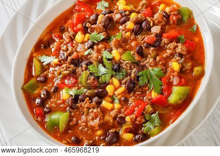 Close-up Of Taco Soup Of Ground Beef, Tomatoes, Chopped Green Chilis, Onions, Corn, Red Beans And Ta