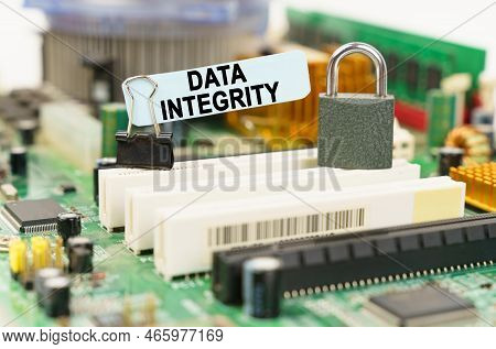 Computer Security Concept. There Is A Sticker On The Motherboard That Says - Data Integrity