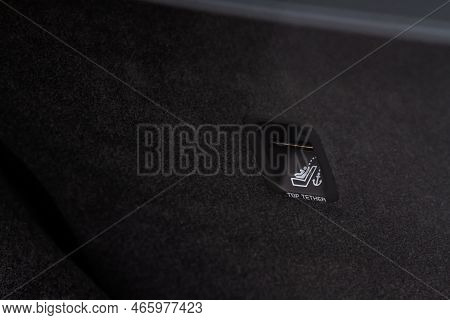 Sign On Black Leather Seat. Iclamping For Child Car Seats.