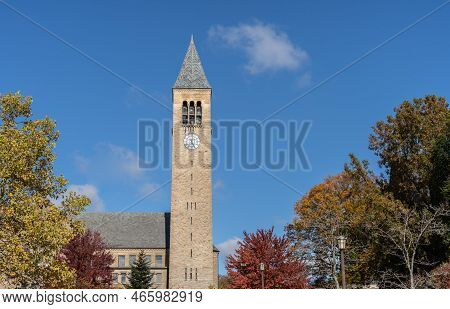 Ithaca, New York-october 24, 2022: Mcgraw Tower With A Blue-sky And Fall Foliage Background On The C