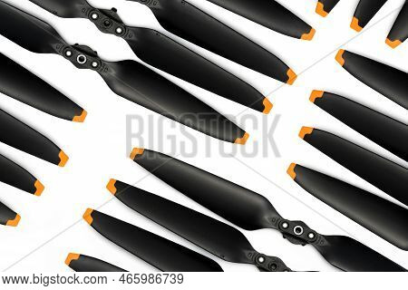 Top View Of Drone Propeller Blades On White. Drone Propellers Made From Plastic Carbon Fiber. Spare 