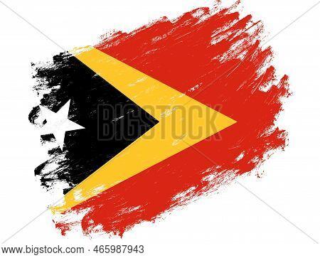 East Timor Flag Painted On A Grunge Brush Stroke White Background
