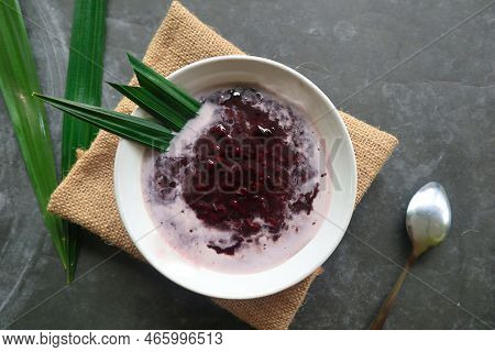 Black Sticky Rice Porridge In A Bowl. Bubur Ketan Hitam
