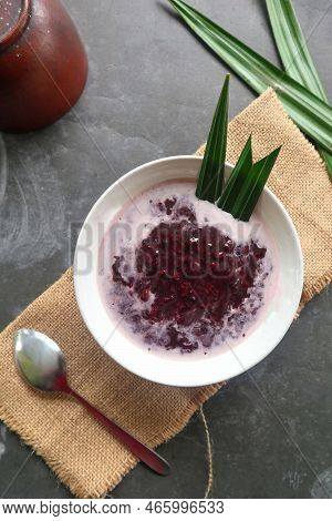 Black Sticky Rice Porridge In A Bowl. Bubur Ketan Hitam