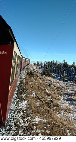 Brocken Steam Locomotice Running Up Hill Winter Blue Sky