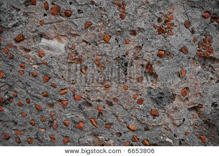 wenig Steine in einem Zement big Stone.