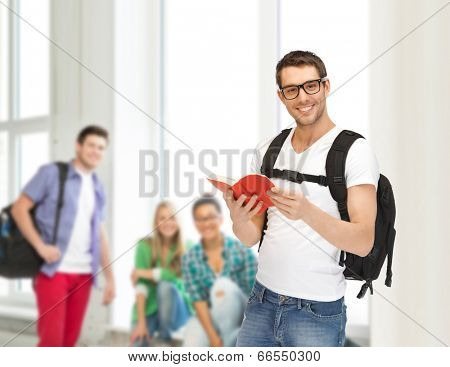 travel, vacation and education concept - travelling student with backpack and book