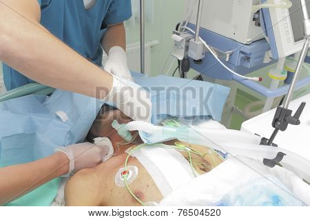 Teamwork With Patient Seriously Injured In The Icu. The Doctor And Nurse.