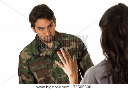wife of military soldier waving goodbye