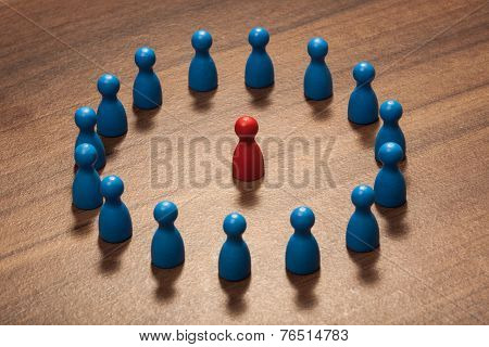 Inside The Circle, Figurine Concept On Wood Table