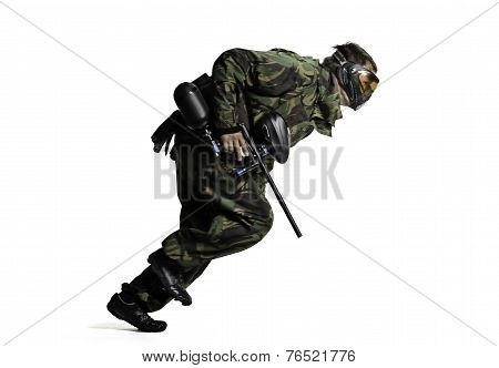 Painball player in action isolated