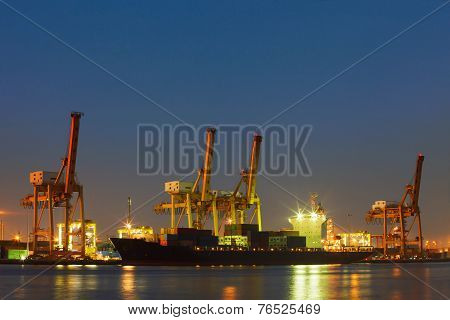 Beautiful Lighting Of Freight Container Comercial Ship With Ship Yard Crane Tool Use For Naval Tradi