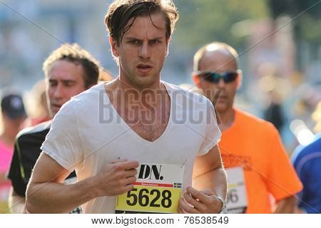 Running Focused Young Man