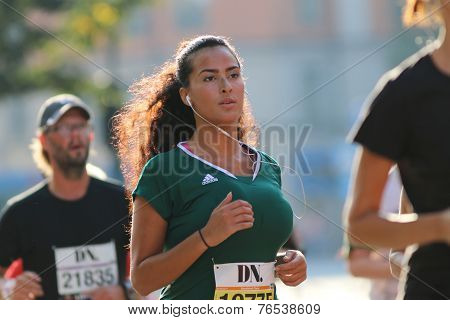 Young Beautiful Latin Woman Running