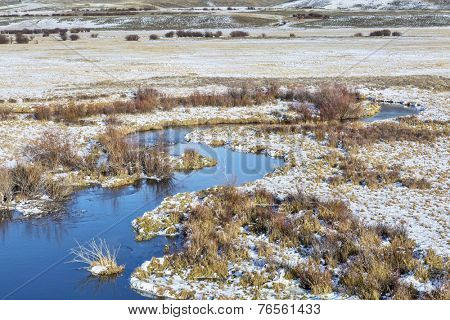 meanders of Canadian River in North Park near Walden, Colorado, late fall or early scenery