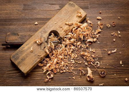 Old vintage carpenter jointer tool on wooden table