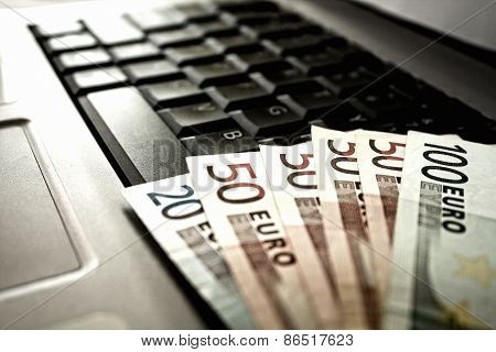 Money And Laptop