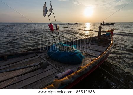 Traditional Thai fishing boat on the sunrise