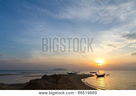 Traditional Thai fishing boat on the sunrise
