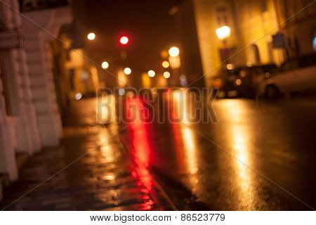 Street blurred lights after rain.